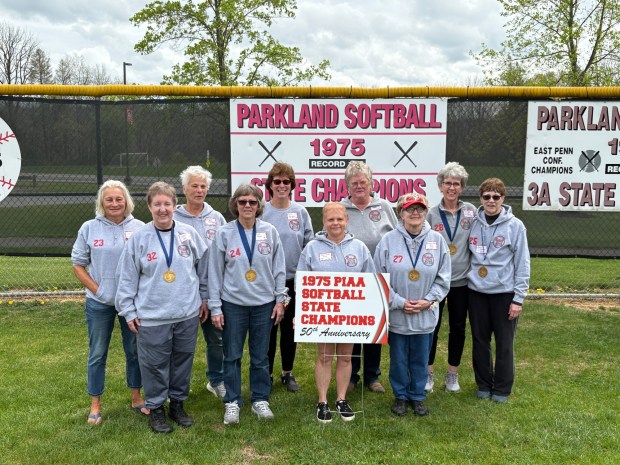 Members of the 1975 Parkland softball state championship team recently reunited at the current Trojans softball field. Front row, left to right, Karen Leh, LaRue Moser, Robin Kramer Lynn, and Joanne Knerr Wehr. Back row, left to right, Sheri Christman Kelly, JoAnne Geiger, Vykie Smoyer Whipple, Jane Mann, Denise Scherr Reifinger, Donna Spence Katcher. (Keith Groller)