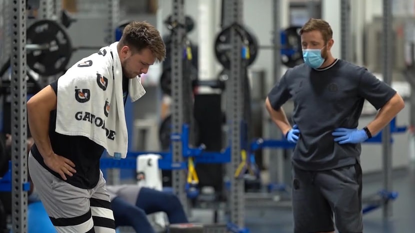 Dallas Mavericks guard Luka Doncic exercises during a team workout on Thursday, July 2, 2020. 