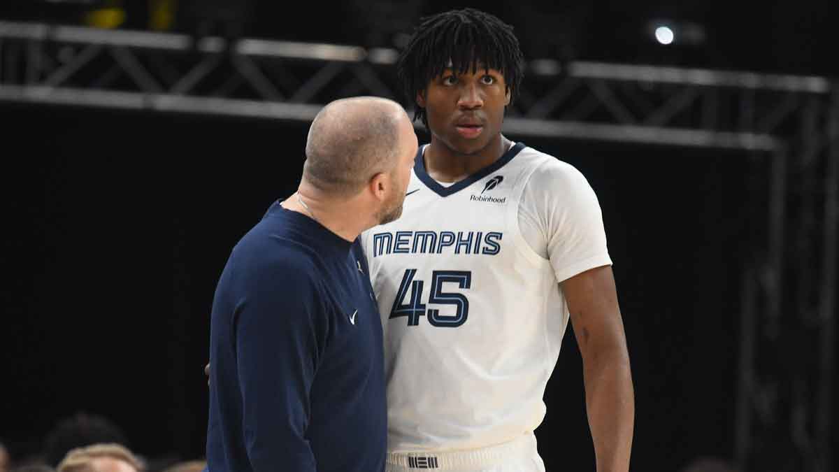 Mar 15, 2025; Memphis, Tennessee, USA; Memphis Grizzlies head coach talks to Memphis Grizzlies forward GG Jackson (45) in the second quarter of the game against the Miami Heat at FedExForum. Mandatory Credit: Matthew Smith-Imagn Images