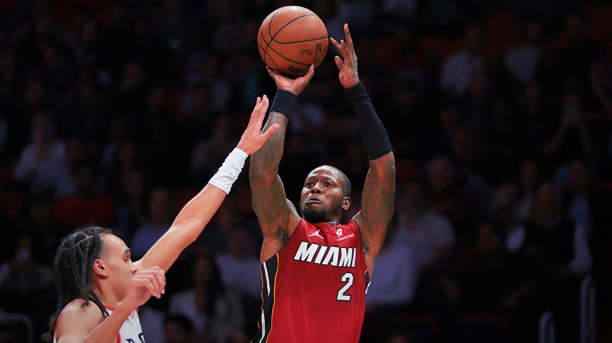 Miami Heat guard Terry Rozier (2) shot the basketball over Portland Trail Blazers guard Dalano Banton (5) during the second quarter at Kaseya Center.