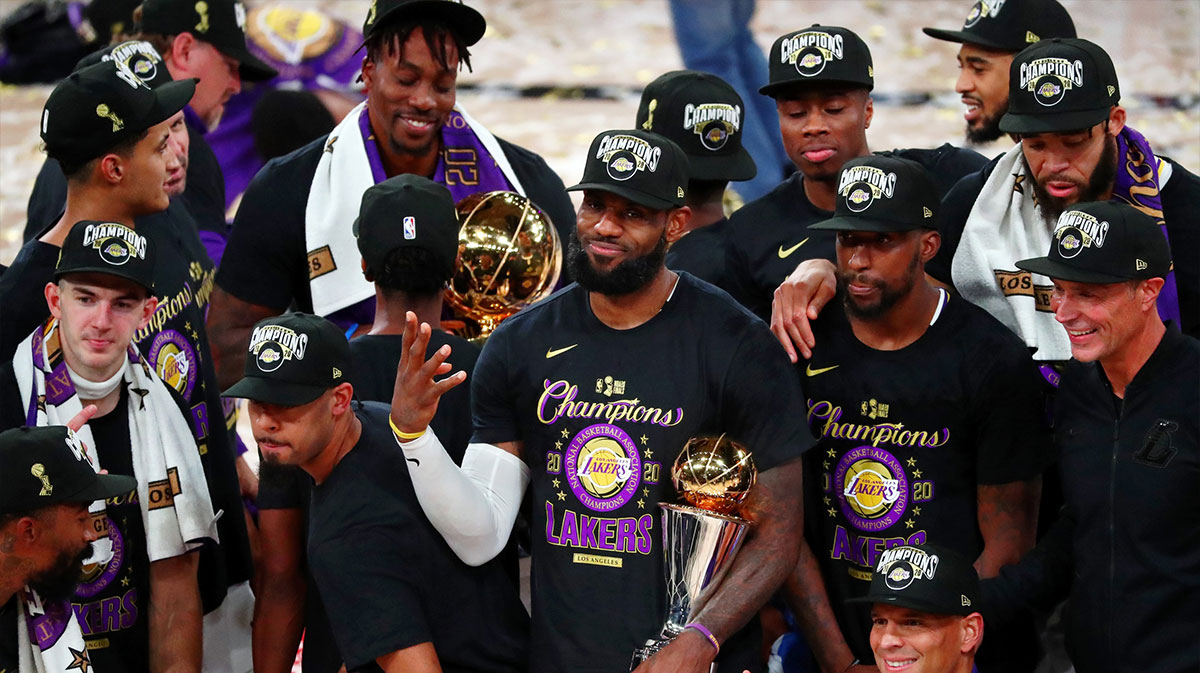 Los Angeles Lakers forward LeBron James (23) holds up four fingers after winning his fourth NBA championship after game six of the 2020 NBA Finals at AdventHealth Arena. The Los Angeles Lakers won 106-93 to win the series.
