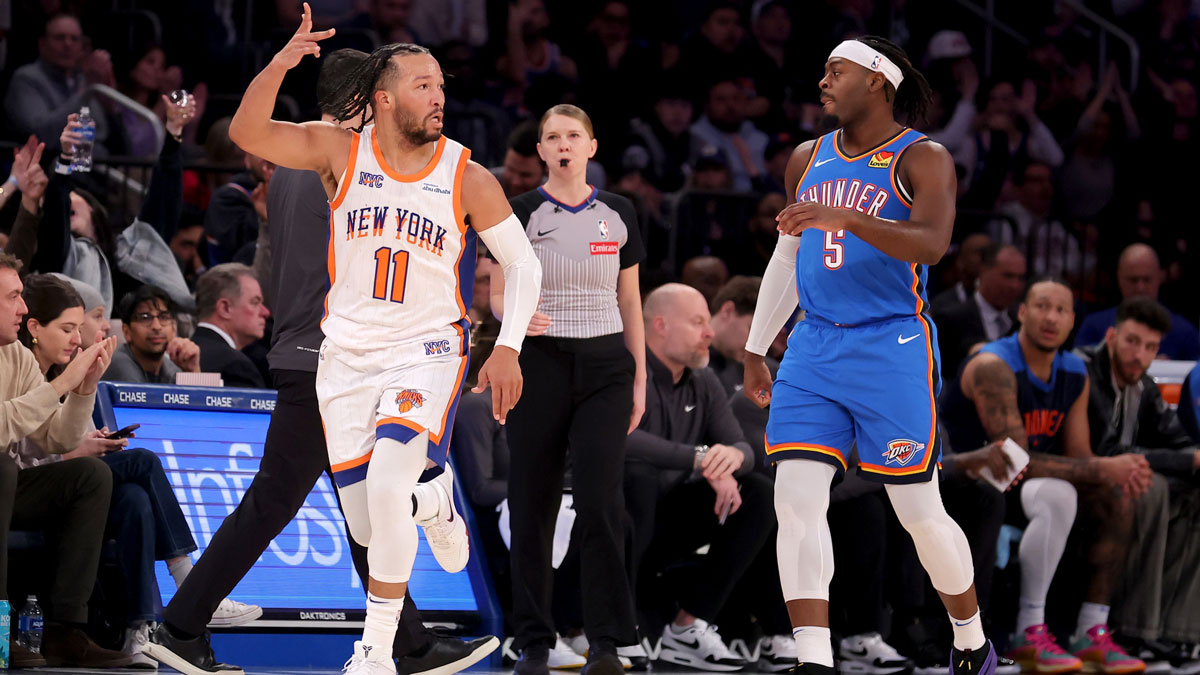 New York Knicks guard Jalen Brunson (11) celebrates his three point shot against Oklahoma City Thunder guard Luguentz Dort (5) during the first quarter at Madison Square Garden.