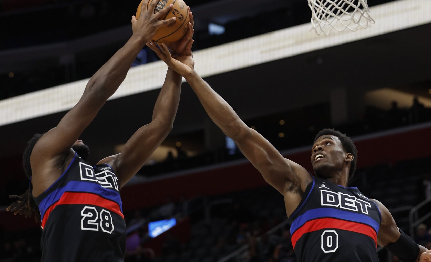 Jan 17, 2024; Detroit, Michigan, USA; Detroit Pistons center Isaiah Stewart (28) and center Jalen Duren (0) go for the rebound in the first half at Little Caesars Arena. Mandatory Credit: Rick Osentoski-USA TODAY Sports