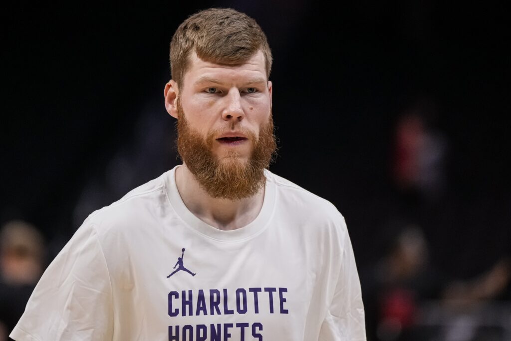 Apr 10, 2024; Atlanta, Georgia, USA; Charlotte Hornets forward Davis Bertans (9) shown on the court prior to the game against the Atlanta Hawks at State Farm Arena. Mandatory Credit: Dale Zanine-USA TODAY Sports