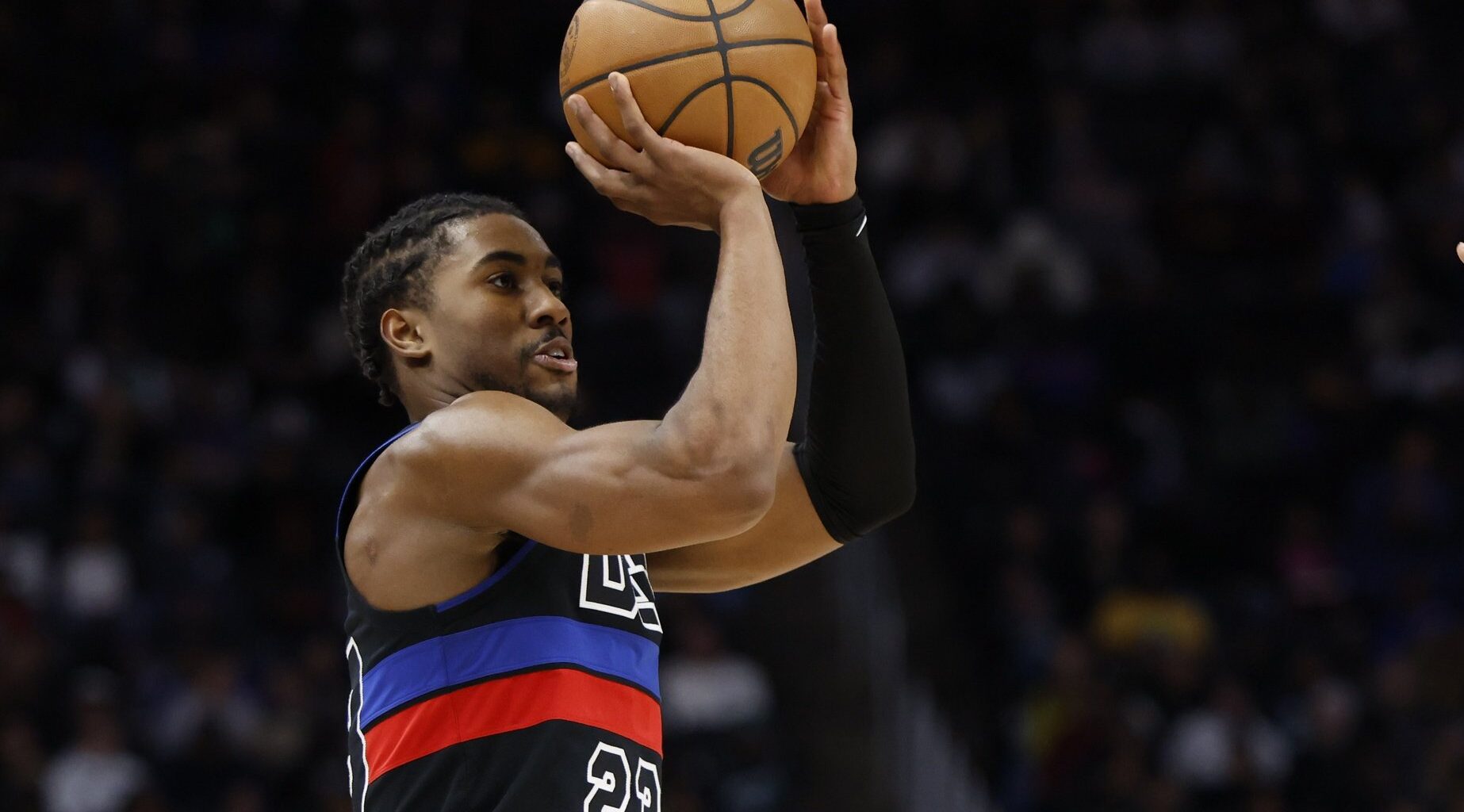 Nov 30, 2024; Detroit, Michigan, USA; Detroit Pistons guard Jaden Ivey (23) shoots in the first half against the Philadelphia 76ers at Little Caesars Arena. Mandatory Credit: Rick Osentoski-Imagn Images