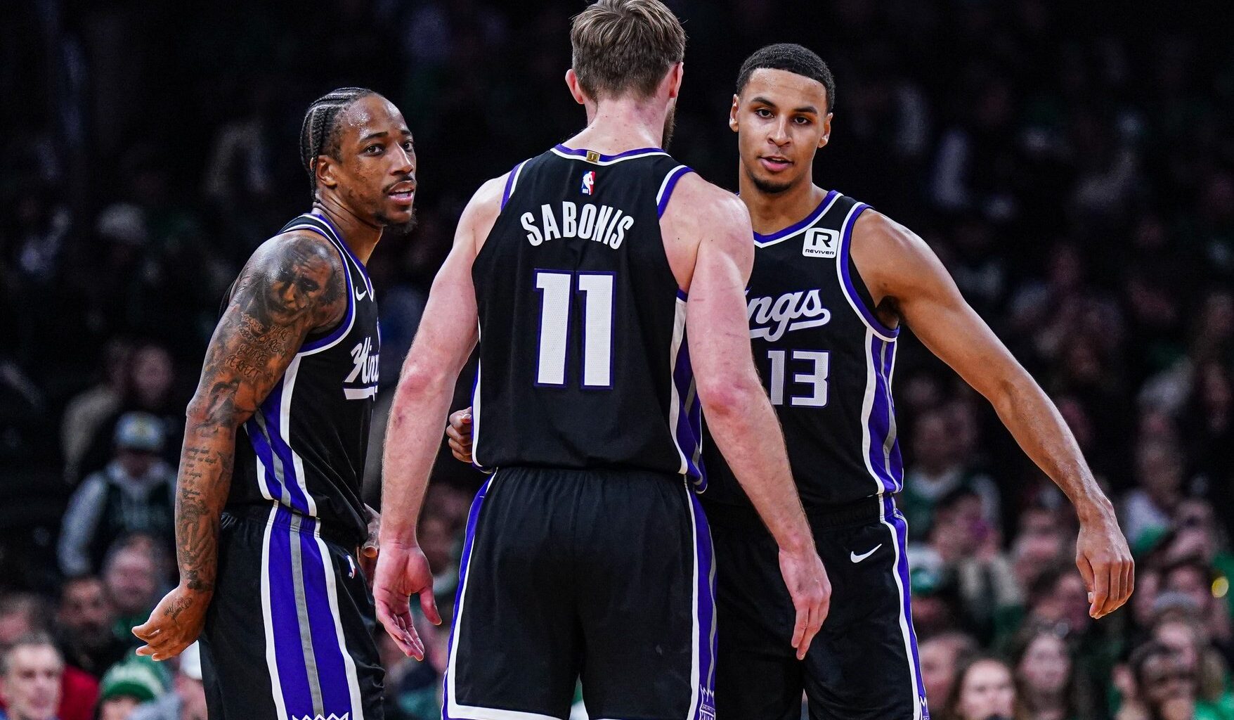 Sacramento Kings forward DeMar DeRozan (10), forward Keegan Murray (13) and forward Domantas Sabonis