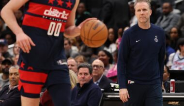 Apr 2, 2025; Washington, District of Columbia, USA; Washington Wizards head coach Brian Keefe (R) looks on from the bench against the Sacramento Kings in the second half at Capital One Arena. Mandatory Credit: Geoff Burke-Imagn Images