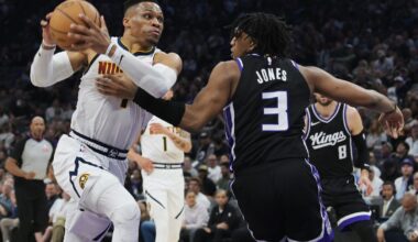 Apr 9, 2025; Sacramento, California, USA; Denver Nuggets guard Russell Westbrook (4) drives to the basket against Sacramento Kings center Isaac Jones (3) during the second quarter at Golden 1 Center. Mandatory Credit: Ed Szczepanski-Imagn Images