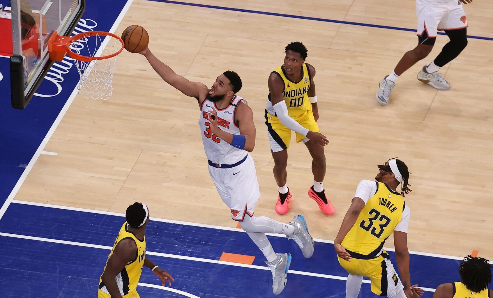 May 29, 2025; New York, New York, USA; New York Knicks center Karl-Anthony Towns (32) shoots against the Indiana Pacers in the fourth quarter during game five of the eastern conference finals for the 2025 NBA Playoffs at Madison Square Garden. Mandatory Credit: Brad Penner-Imagn Images