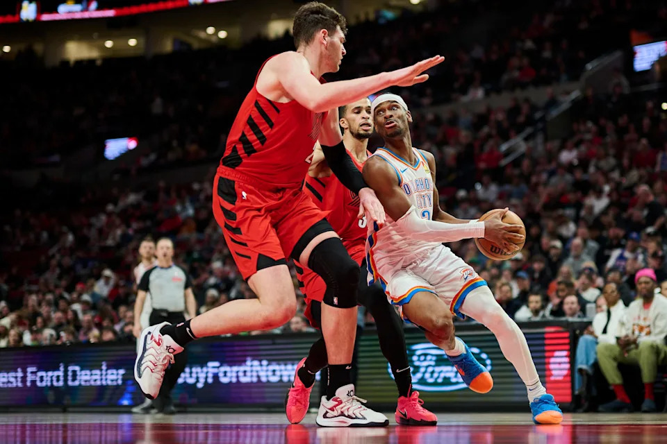 Jan 26, 2025; Portland, Oregon, USA; Oklahoma City Thunder guard Shai Gilgeous-Alexander (2) drives to the basket during the first half against Portland Trail Blazers center Donovan Clingan (23) at Moda Center. Mandatory Credit: Troy Wayrynen-Imagn Images