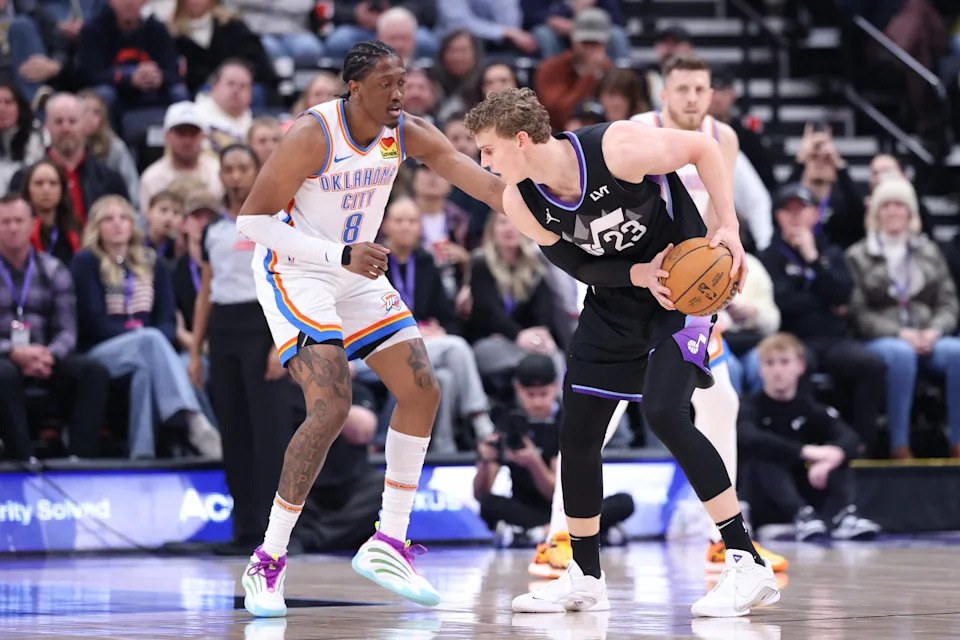 Feb 21, 2025; Salt Lake City, Utah, USA; Utah Jazz forward Lauri Markkanen (23) sets a play against Oklahoma City Thunder forward Jalen Williams (8) during the first quarter at Delta Center. Mandatory Credit: Rob Gray-Imagn Images