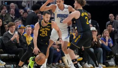 Wiggins and Curry lead Warriors in fight to hold off Magic rally