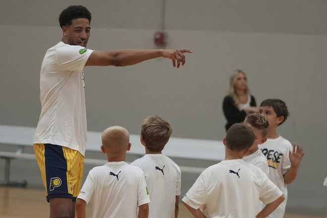 Indiana Pacers' Tyrese Haliburton talks to participants during his basketball camp at the Indiana Pacers Athletic Center, Saturday, Aug. 23, 2025, in Westfield, Indiana. Indiana Pacers' Tyrese Haliburton talks to participants during his basketball camp at the Indiana Pacers Athletic Center, Saturday, Aug. 23, 2025, in Westfield, Indiana.
