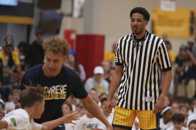Indiana Pacers' Tyrese Haliburton watches a scrimmage during his basketball camp at the Indiana Pacers Athletic Center, Saturday, Aug. 23, 2025, in Westfield, Indiana. Indiana Pacers' Tyrese Haliburton watches a scrimmage during his basketball camp at the Indiana Pacers Athletic Center, Saturday, Aug. 23, 2025, in Westfield, Indiana.