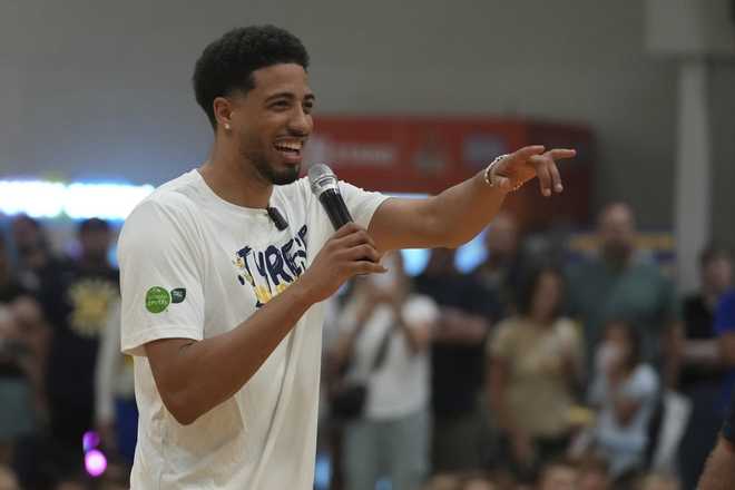 Indiana Pacers' Tyrese Haliburton talks to participants during his basketball camp at the Indiana Pacers Athletic Center, Saturday, Aug. 23, 2025, in Westfield, Indiana. Indiana Pacers' Tyrese Haliburton talks to participants during his basketball camp at the Indiana Pacers Athletic Center, Saturday, Aug. 23, 2025, in Westfield, Indiana.