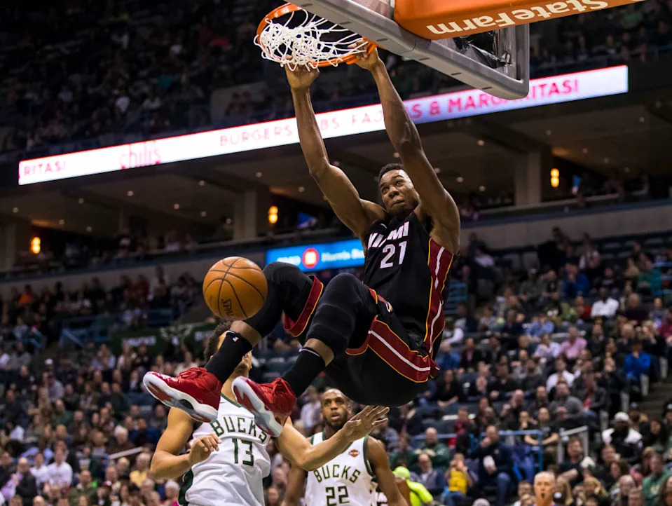 Jan 17, 2018; Milwaukee, WI, USA; Miami Heat center Hassan Whiteside (21) dunks during the third quarter against the Milwaukee Bucks at BMO Harris Bradley Center. Mandatory Credit: Jeff Hanisch-USA TODAY Sports© Jeff Hanisch-Imagn Images
