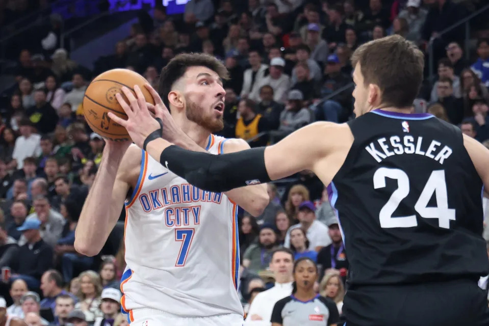 Feb 21, 2025; Salt Lake City, Utah, USA; Oklahoma City Thunder forward Chet Holmgren (7) goes to the basket against Utah Jazz center Walker Kessler (24) during the second quarter at Delta Center. Mandatory Credit: Rob Gray-Imagn Images
