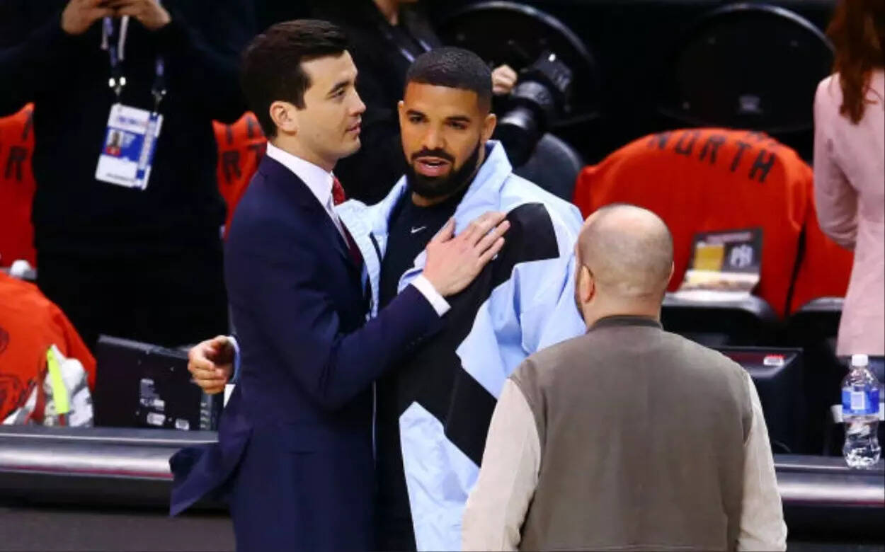 Bobby Webster with Drake supporting the Toronto Raptors