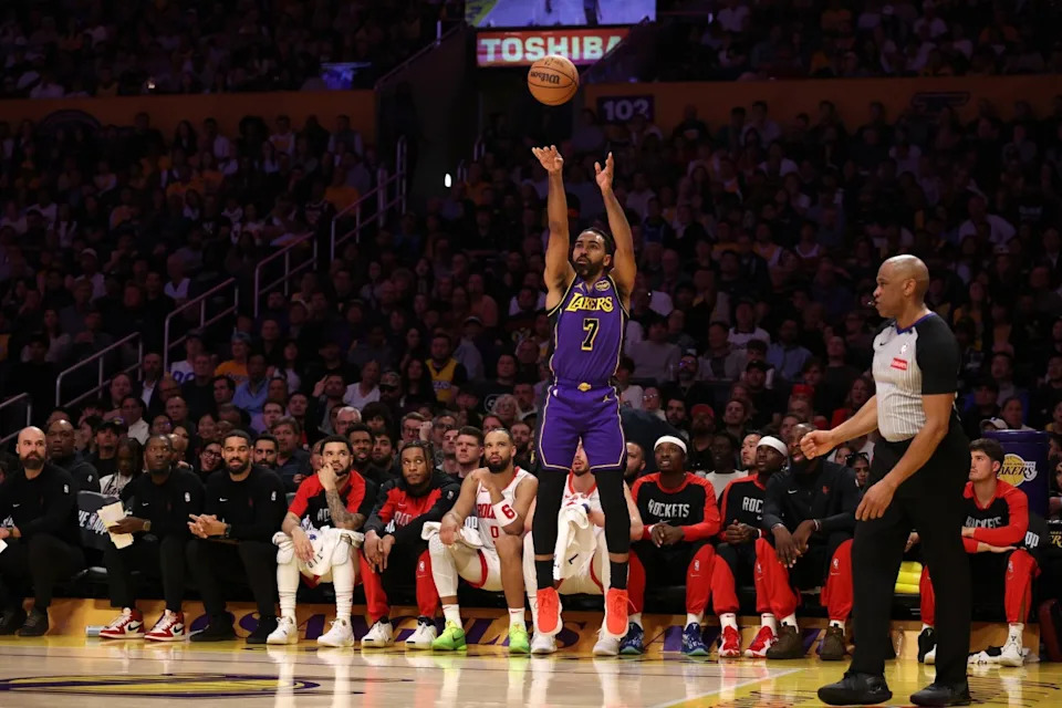 Los Angeles Lakers guard Gabe Vincent rises to take a 3-point shot against the Houston Rockets at Crypto.com Arena on March 31, 2025.Kiyoshi Mio-Imagn Images