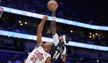 New Orleans Pelicans forward Brandon Ingram (14) leaps for a rebound over Cleveland Cavaliers forward Isaac Okoro (35) in the first half of an NBA basketball game in New Orleans, Wednesday, Nov. 6, 2024. (AP Photo/Gerald Herbert)