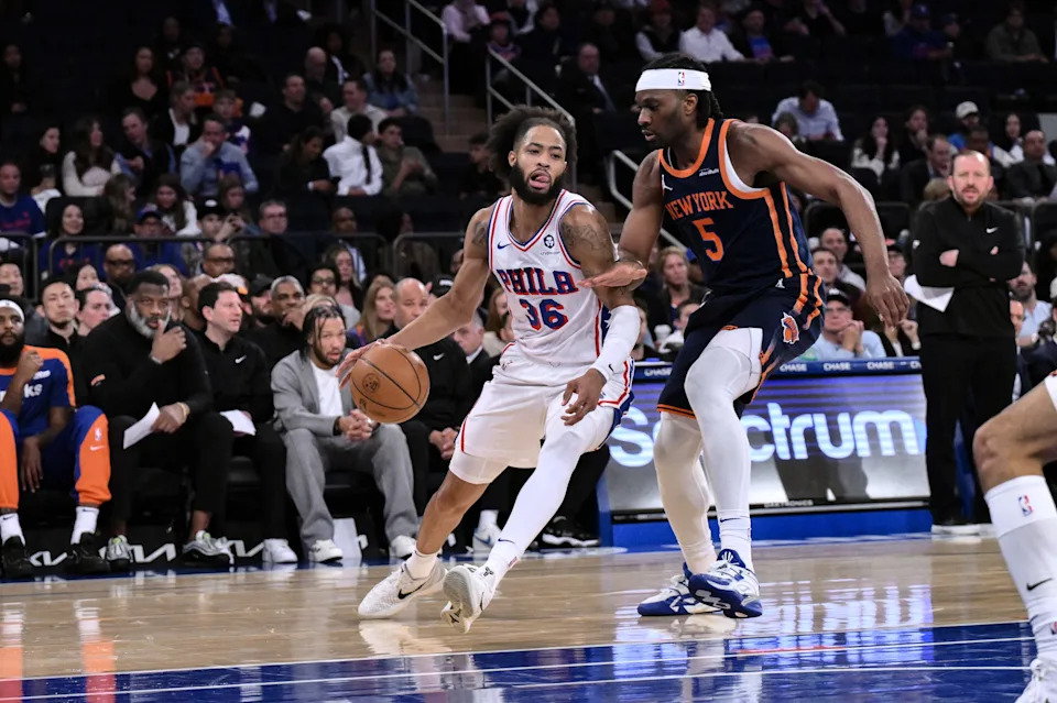 Apr 1, 2025; New York, New York, USA; Philadelphia 76ers forward Phillip Wheeler (36) drives against New York Knicks forward Precious Achiuwa (5) during the second half at Madison Square Garden. Mandatory Credit: John Jones-Imagn Images
