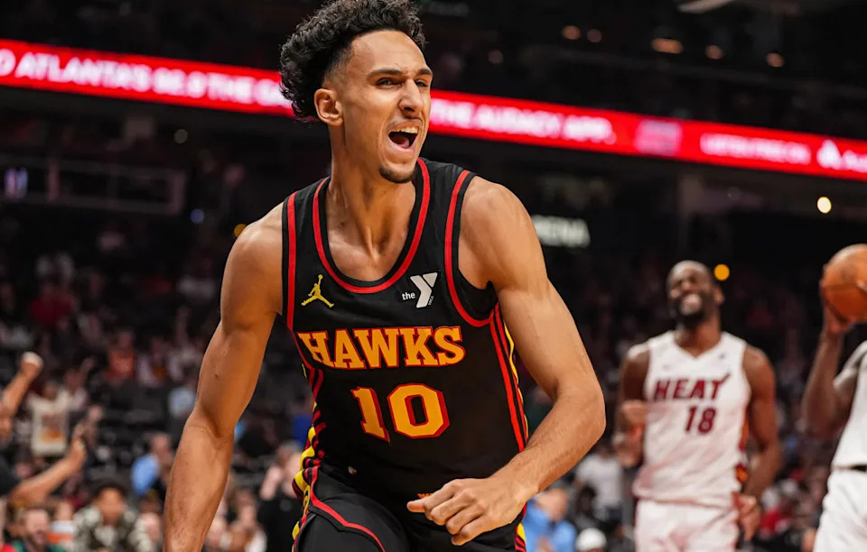 Atlanta Hawks forward Zaccharie Risacher (10) reacts after scoring a basket against the Miami Heat during the first half at State Farm Arena. Mandatory Credit: Dale Zanine-Imagn ImagesMandatory Credit: Dale Zanine-Imagn Images