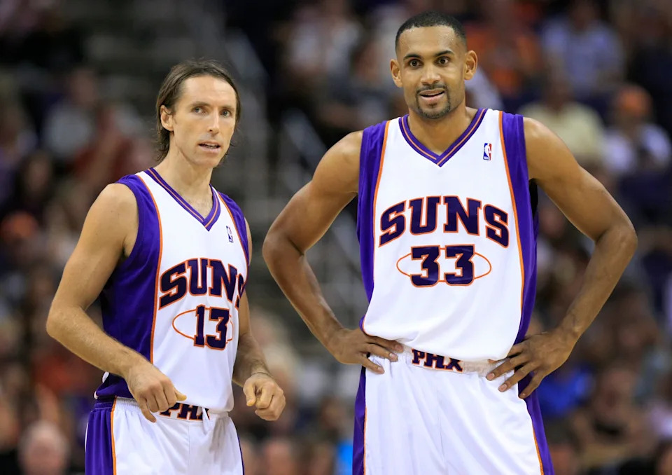 Phoenix Suns' Steve Nash (13) and Grant Hill (33) against the Philadelphia 76’ers during NBA preseason action at US Airways Center in Phoenix on Oct. 16, 2009.