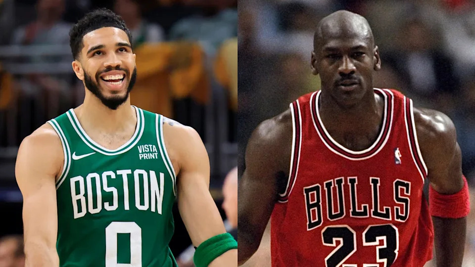 Jayson Tatum in a Boston Celtics jersey and Michael Jordan in a Chicago Bulls jersey, both on the court.