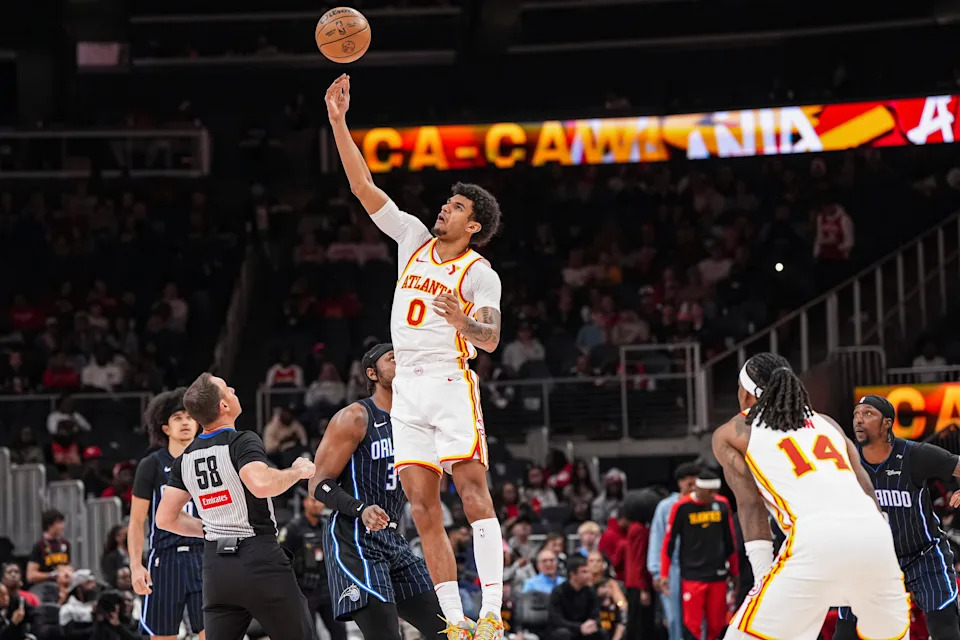 Apr 13, 2025; Atlanta, Georgia, USA; Atlanta Hawks forward Dominick Barlow (0) wins the opening tip against the Orlando Magic during the first half at State Farm Arena. Mandatory Credit: Dale Zanine-Imagn Images
