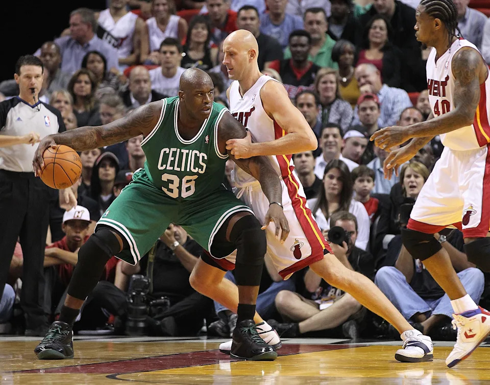 MIAMI - NOVEMBER 11: Shaquille O'Neal #36 of the Boston Celtics is guarded by Zydrunas Ilgauskas #11 during a game against the Miami Heat at American Airlines Arena on November 11, 2010 in Miami, Florida. NOTE TO USER: User expressly acknowledges and agrees that, by downloading and/or using this Photograph, User is consenting to the terms and conditions of the Getty Images License Agreement. (Photo by Mike Ehrmann/Getty Images)