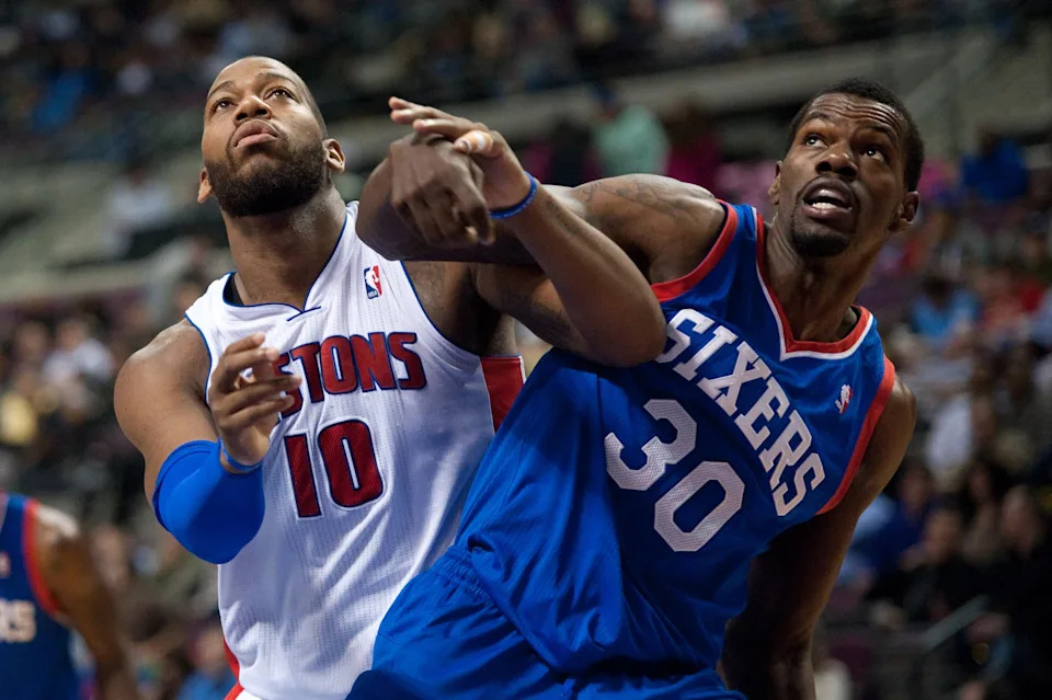 Feb 1, 2014; Auburn Hills, MI, USA; Philadelphia 76ers center Dewayne Dedmon (30) boxes out Detroit Pistons power forward Greg Monroe (10) during the second quarter at The Palace of Auburn Hills. Mandatory Credit: Tim Fuller-USA TODAY Sports