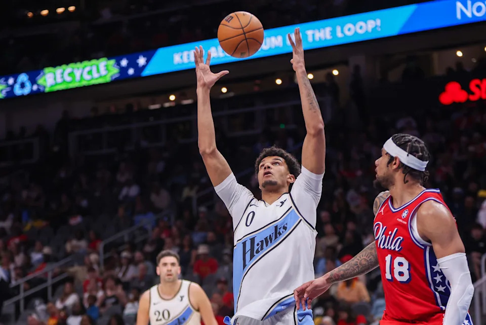 Mar 23, 2025; Atlanta, Georgia, USA; Atlanta Hawks forward Dominick Barlow (0) grabs a rebound against the Philadelphia 76ers in the fourth quarter at State Farm Arena. Mandatory Credit: Brett Davis-Imagn Images
