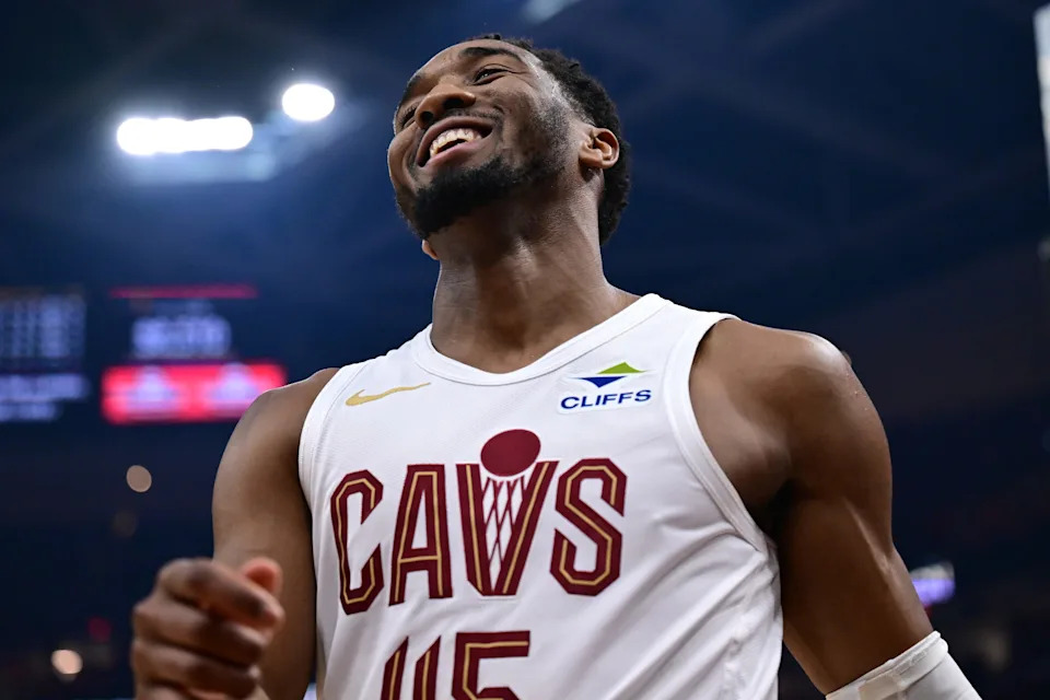 Mar 30, 2025; Cleveland, Ohio, USA; Cleveland Cavaliers guard Donovan Mitchell (45) smiles after missing a layup during the first half against the Los Angeles Clippers at Rocket Arena. Mandatory Credit: Ken Blaze-Imagn Images