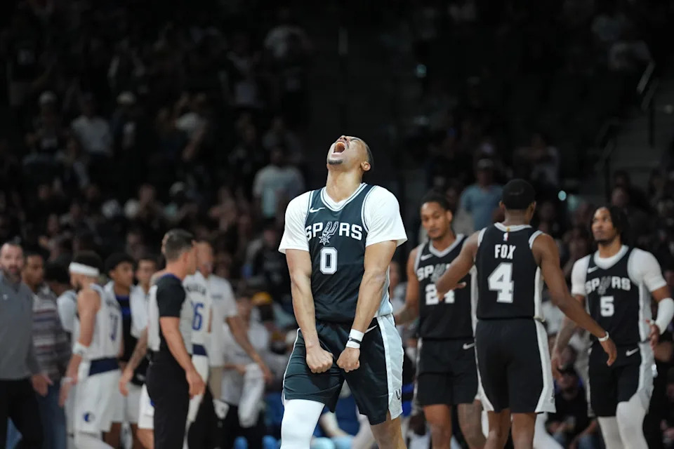 Mar 10, 2025; San Antonio, Texas, USA; San Antonio Spurs forward Keldon Johnson (0) celebrates in the second half against the Dallas Mavericks at Frost Bank Center. © Daniel Dunn-Imagn Images
