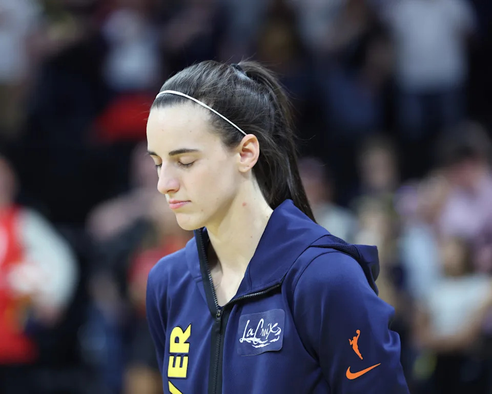 IOWA CITY, IA - MAY 4: Caitlin Clark #22 of the Indiana Fever stands for the National Anthem before the game against the Brazil Women's National Basketball Team during the WNBA preseason game on May 4, 2025 at Carver-Hawkeye Arena in Iowa City, Iowa. (Photo by Jeff Haynes/NBAE via Getty Images)Jeff Haynes/Getty Images