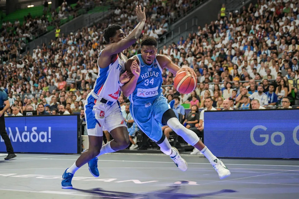 Greece's Giannis Antetokoumpo (R) is marked by France's Alexandre Sarr during a friendly basketball game ahead of the Eurobasket 2025, in Athens on August 24, 2025. (Photo by Aris MESSINIS / AFP) (Photo by ARIS MESSINIS/AFP via Getty Images)
