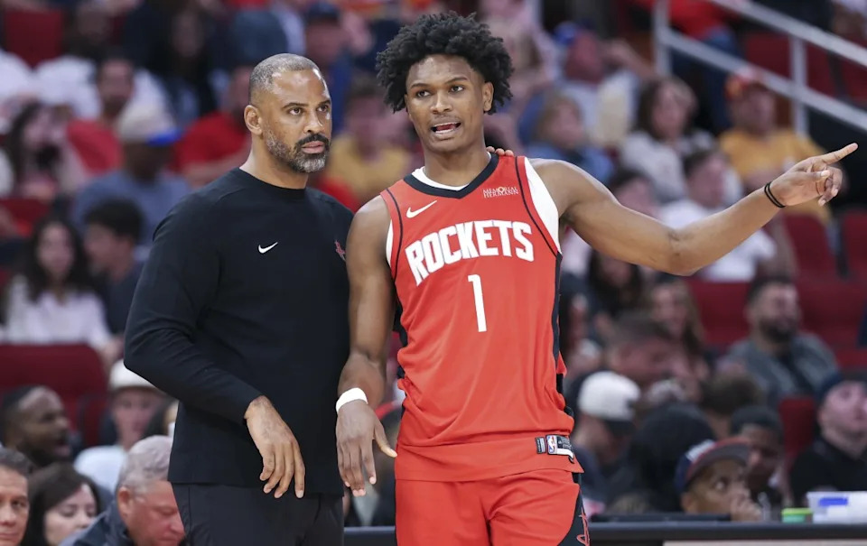 Houston Rockets head coach Ime Udoka talks with forward Amen Thompson (1) during the third quarter against the Memphis Grizzlies at Toyota Center. Mandatory Credit: Troy Taormina-Imagn ImagesCredit: Troy Taormina-Imagn Images