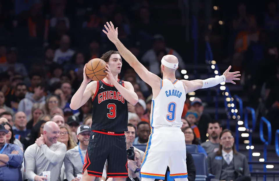 Mar 31, 2025; Oklahoma City, Oklahoma, USA; Chicago Bulls guard Josh Giddey (3) looks to pass as Oklahoma City Thunder guard Alex Caruso (9) defends during the second quarter at Paycom Center. Mandatory Credit: Alonzo Adams-Imagn Images
