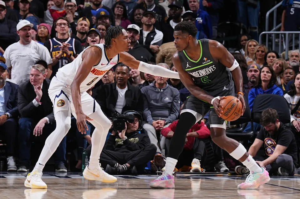 Anthony Edwards #5 of the Minnesota Timberwolves dribbles the ball during the game against the Denver Nuggets on April 1, 2025 at Ball Arena in Denver, Colorado. NBAE via Getty Images
