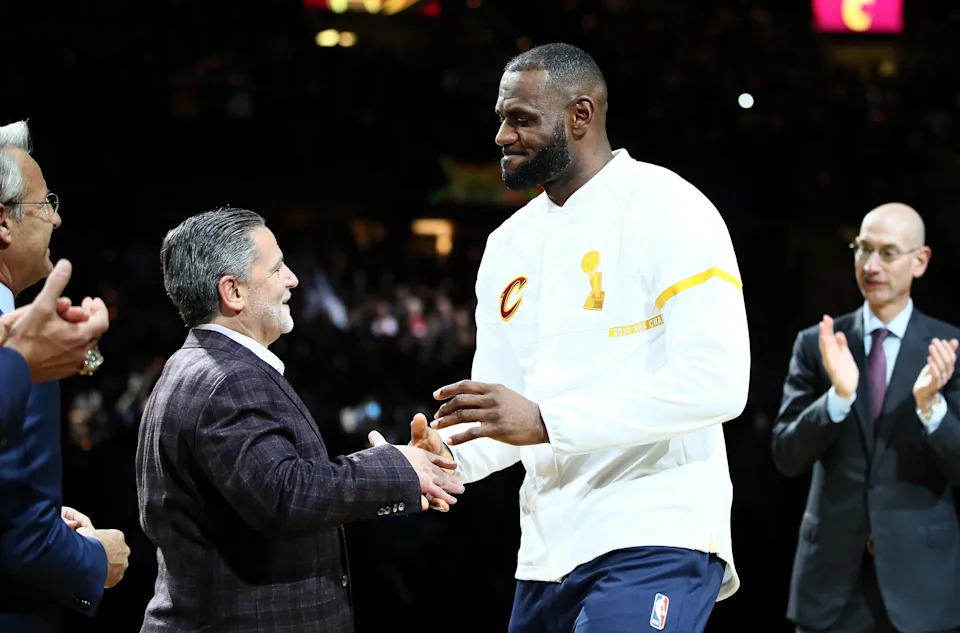 CLEVELAND, OH - OCTOBER 25: LeBron James #23 of the Cleveland Cavaliers receives his championship ring from owner Dan Gilbert before the game against the New York Knicks at Quicken Loans Arena on October 25, 2016 in Cleveland, Ohio. (Photo by Ezra Shaw/Getty Images)