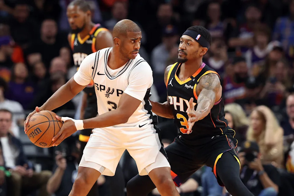 Bradley Beal #3 of the Phoenix Suns pressures Chris Paul #3 of the San Antonio Spurs during the first half of the Emirates NBA Cup game at Footprint Center on Dec. 3, 2024, in Phoenix.