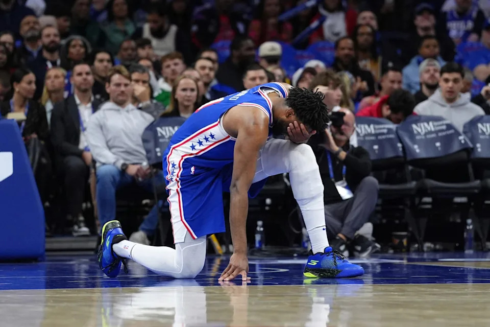 Philadelphia 76ers center Joel Embiid reacts against the Dallas Mavericks.© Kyle Ross-Imagn Images