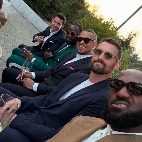LeBron James/Instagram  LeBron James posing alongside Kevin Love, Draymond Green and his close friend Paul Rivera at a wedding in Ojai, Calif.