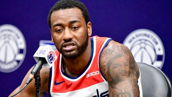 John Wall retires from professional basketball, confirming the news via social media.