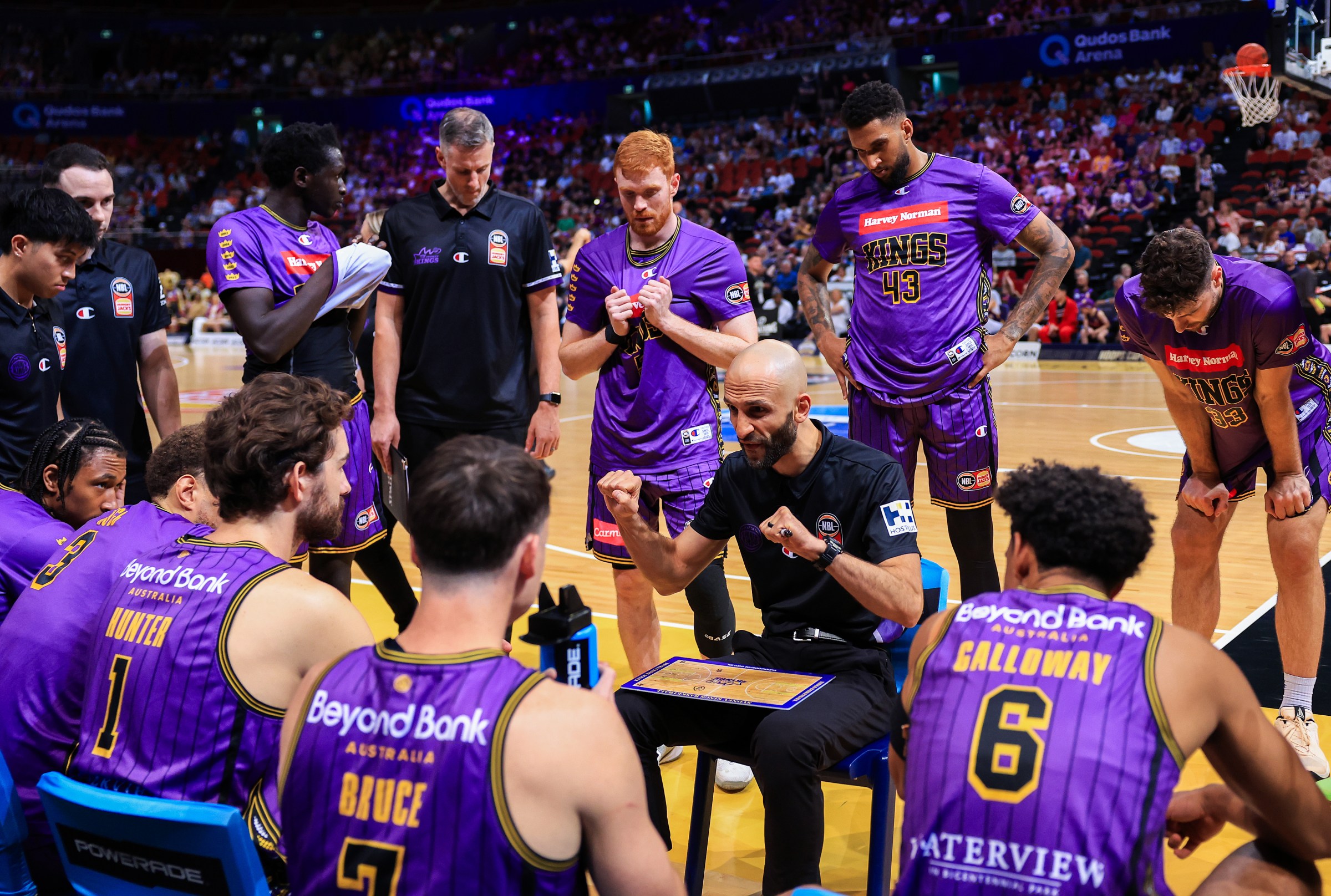 SYDNEY, AUSTRALIA - DECEMBER 29: Mahmoud Abdelfattah, Head Coach of the Kings addresses his player during the round 13 NBL match between Sydney Kings and Cairns Taipans at Qudos Bank Arena, on December 29, 2023, in Sydney, Australia. (Photo by Mark Evans/Getty Images)