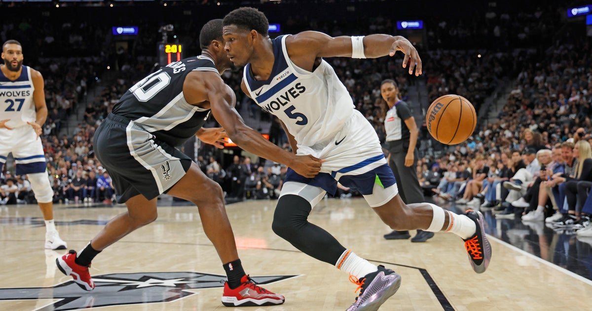 Johnson and Paul lead Spurs past Timberwolves 113-103 as Popovich misses game with illness