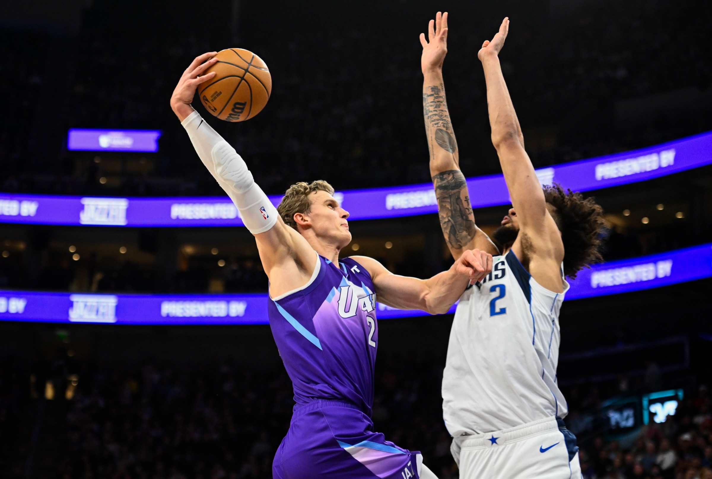 SALT LAKE CITY, UTAH - NOVEMBER 30: Lauri Markkanen #23 of the Utah Jazz attmpts a dunk over Dereck Lively II #2 of the Dallas Mavericks during the first half of a game at Delta Center on November 30, 2024 in Salt Lake City, Utah. NOTE TO USER: User expressly acknowledges and agrees that, by downloading and or using this photograph, User is consenting to the terms and conditions of the Getty Images License Agreement. (Photo by Alex Goodlett/Getty Images)