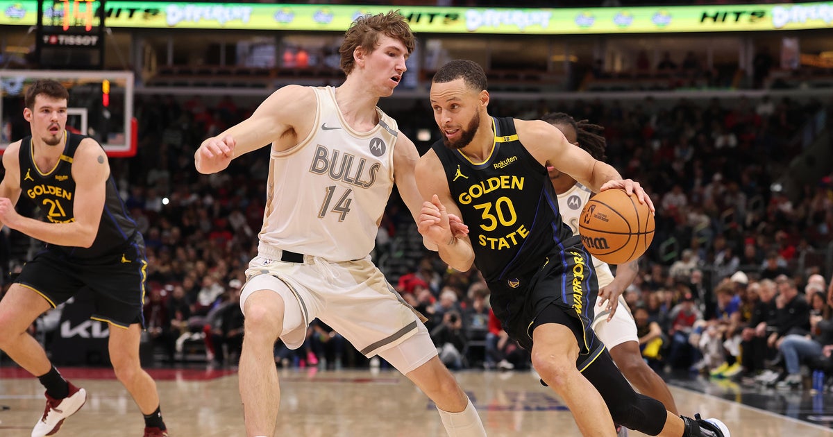 Curry scores 34 as Warriors rally to beat Bulls 132-111 in Jimmy Butler's Golden State debut