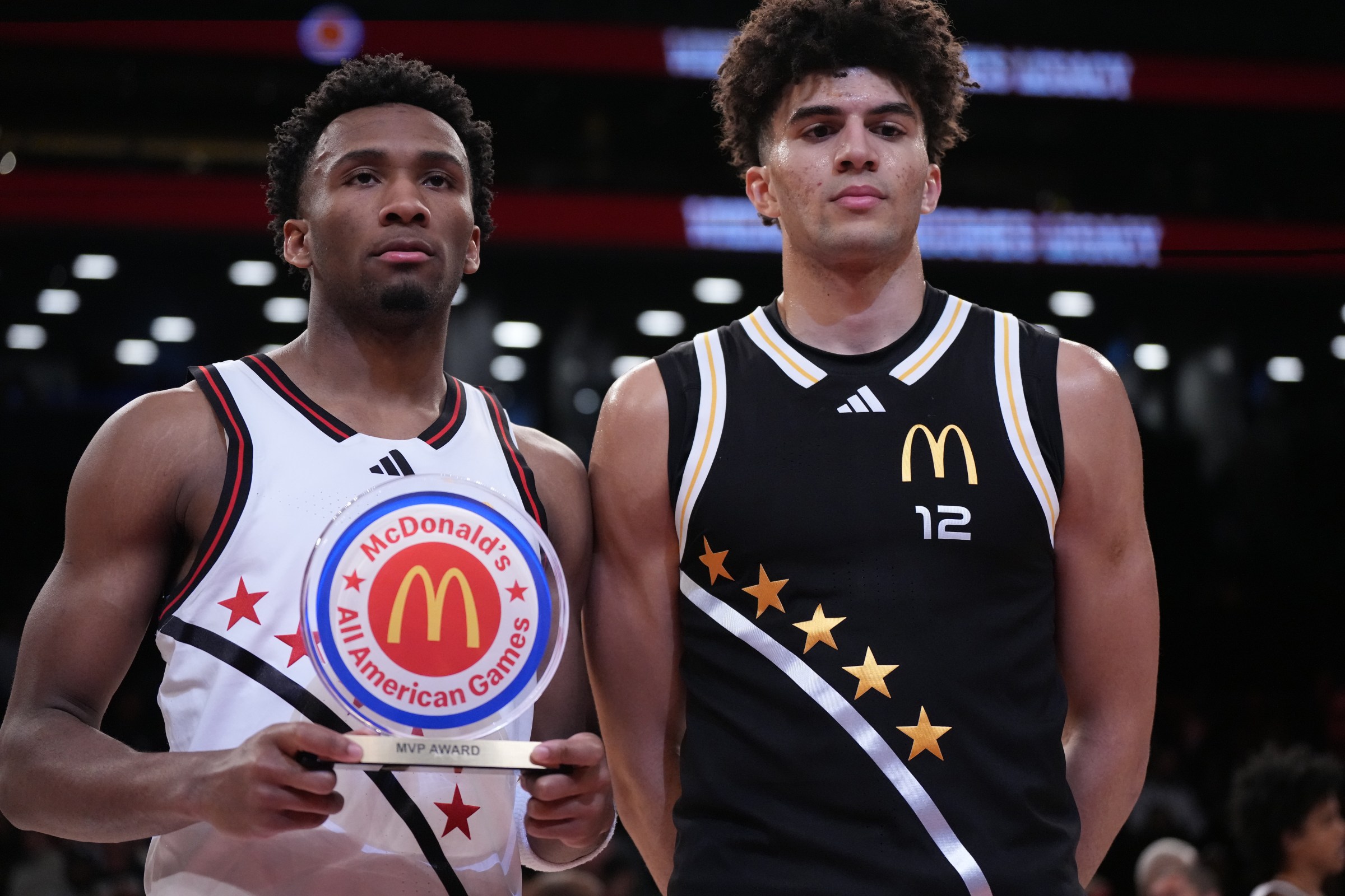 Kansas Jayhawk Darryn Peterson (left) and Duke Blue Devil Cameron Boozer (right) stand with the MVP trophy following the McDonald’s All American game at Barclays Center. (Photo by Erick W. Rasco/Sports Illustrated via Getty Images)