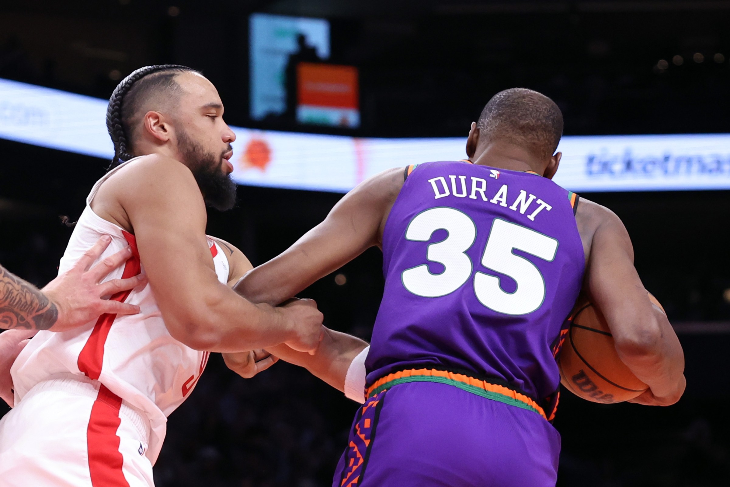 PHOENIX, ARIZONA - MARCH 30: Dillon Brooks #9 of the Houston Rockets pushes Kevin Durant #35 of the Phoenix Suns after being called for a foul during the first half at PHX Arena on March 30, 2025 in Phoenix, Arizona. Brooks was ejected after this play. NOTE TO USER: User expressly acknowledges and agrees that, by downloading and or using this photograph, User is consenting to the terms and conditions of the Getty Images License Agreement. (Photo by Chris Coduto/Getty Images)